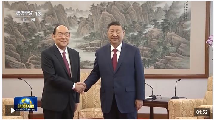 習近平會見賀一誠